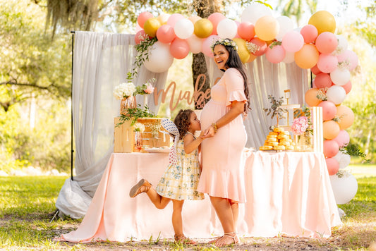 Celebrating Baby's Gender with a Maternity Sash