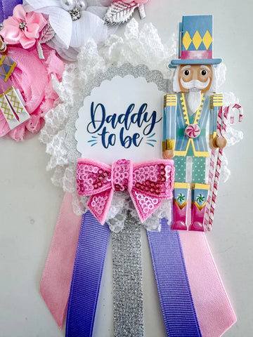 Nutcracker Baby Shower Badge Set – Mommy & Daddy to Be Floral Pins with Holiday Ribbons & Figurines