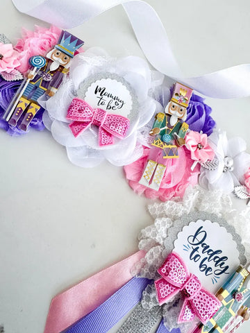 Nutcracker Baby Shower Badge Set – Mommy & Daddy to Be Floral Pins with Holiday Ribbons & Figurines